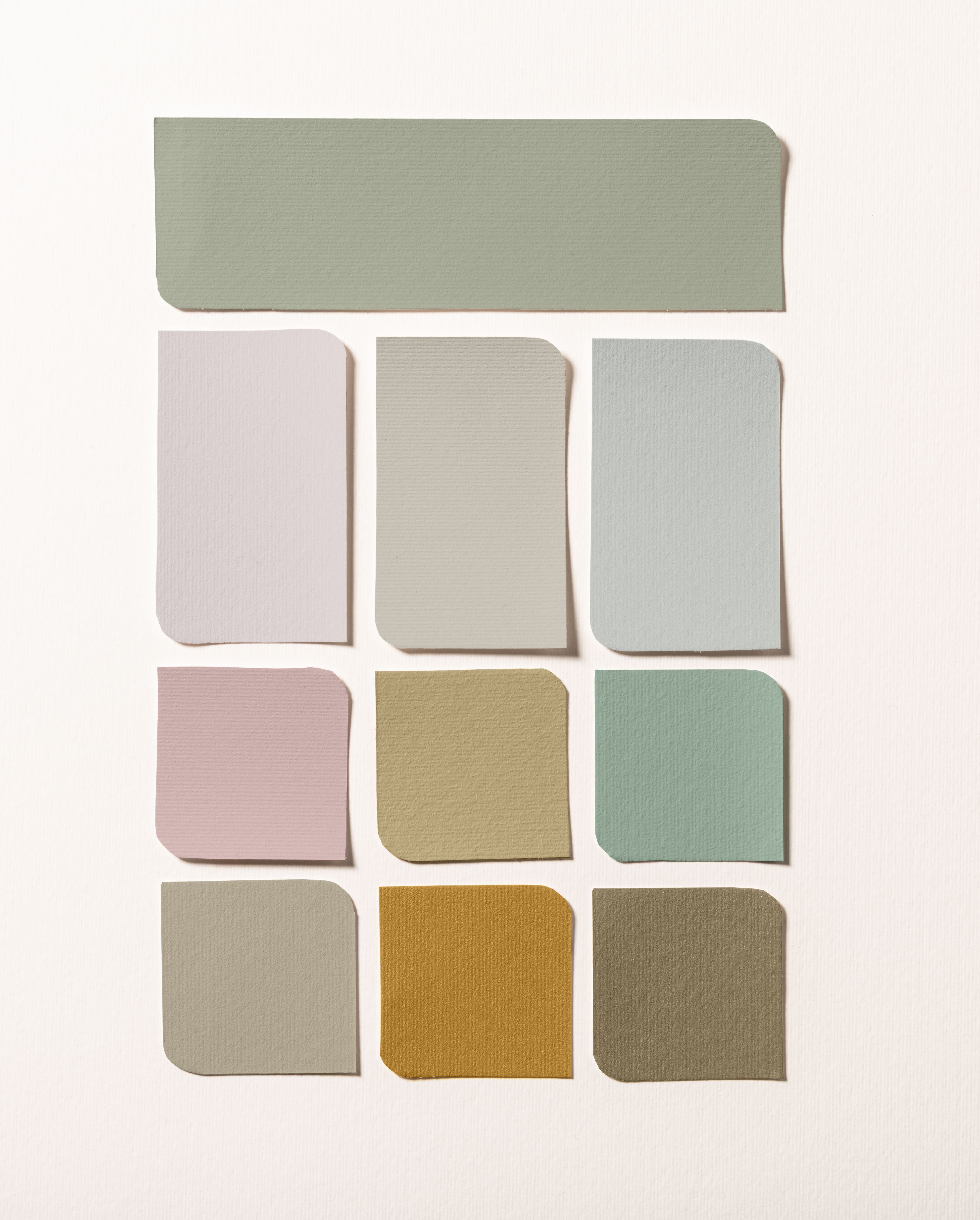 Living room with play clay, green walls, a khaki green ceiling and a colour palette on the right-hand side