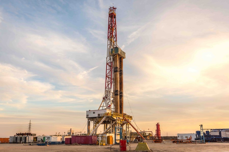 Oil and gas rig at sunset